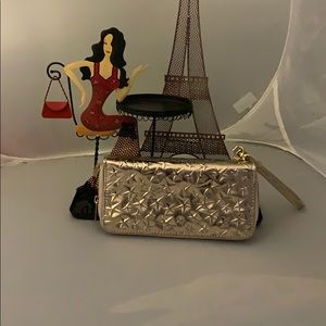 Gold color star wristlet